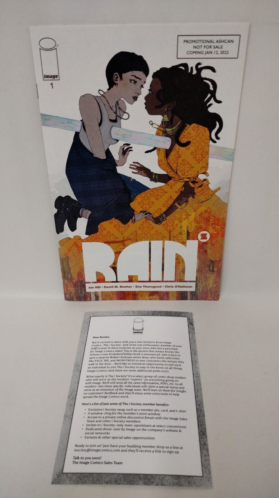 RAIN # 1 (2022) ASHCAN PREVIEW W I SOCIETY CARD IMAGE Comic NM-/NM 1 Per Store