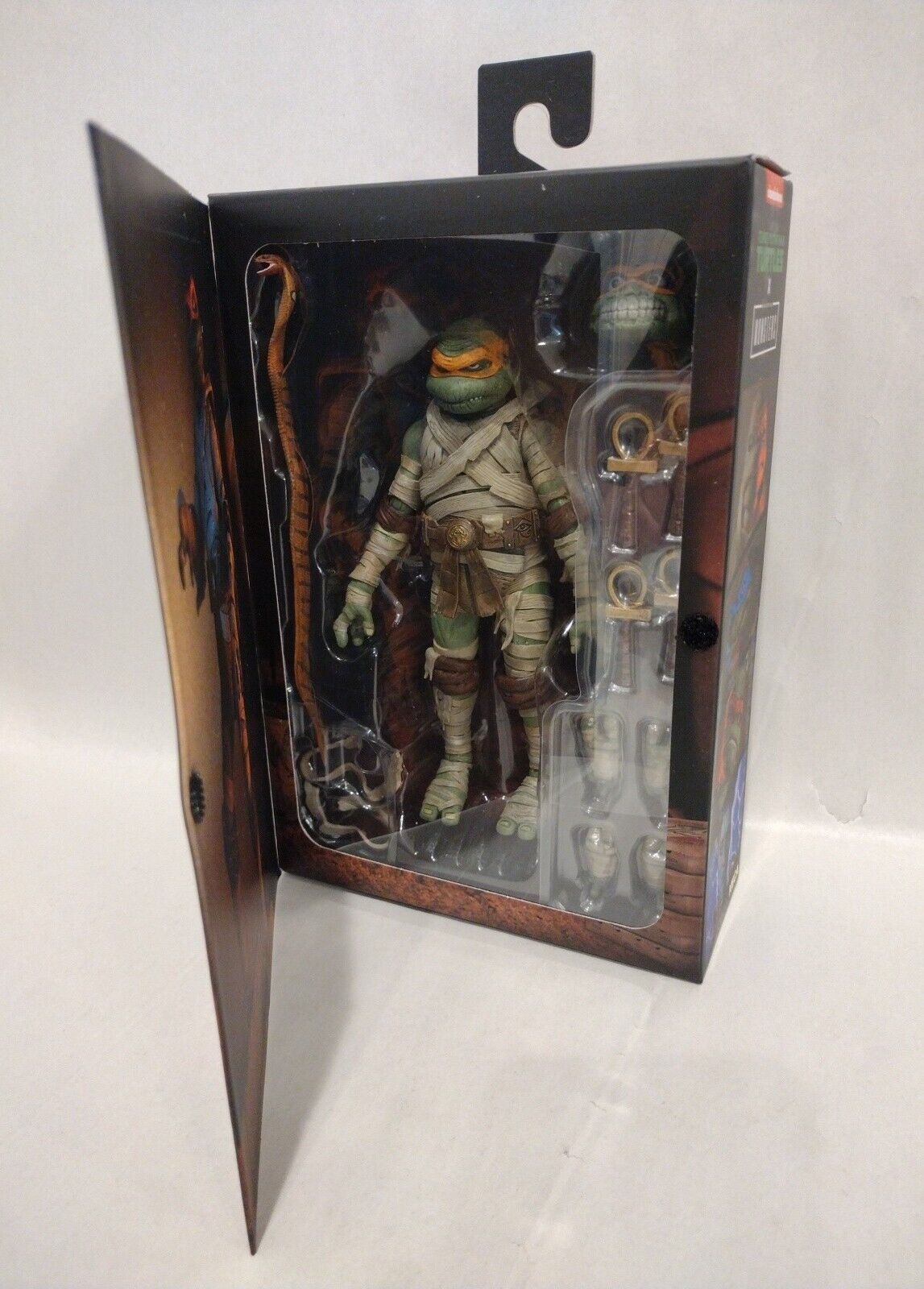 NECA Universal Monsters x Teenage Mutant Ninja Turtles Michelangelo as The Mummy